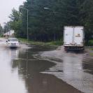 Дождевая вода подступает к домам на одной из улиц Риддера
